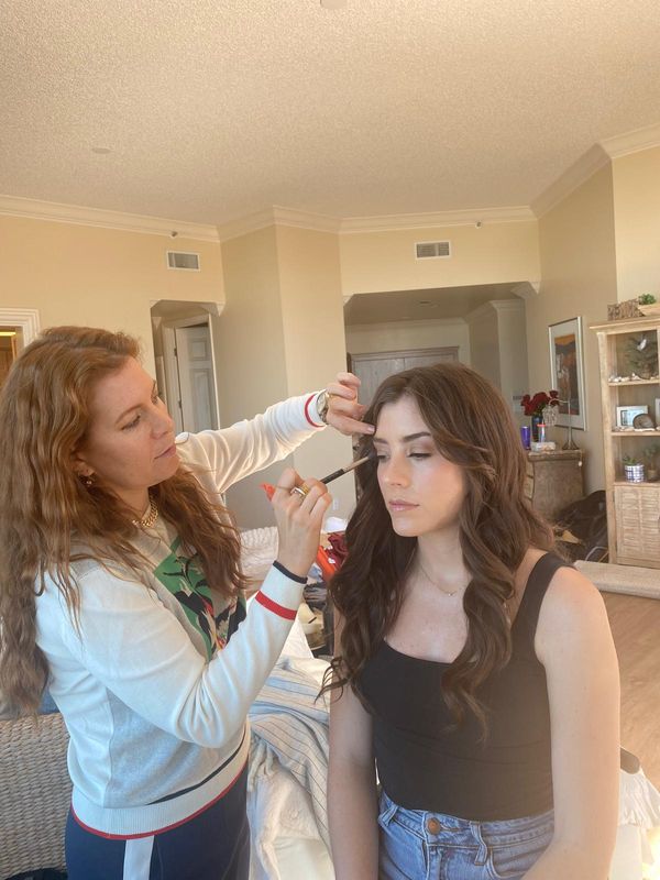 makeup artistry — mimica applying makeup on set